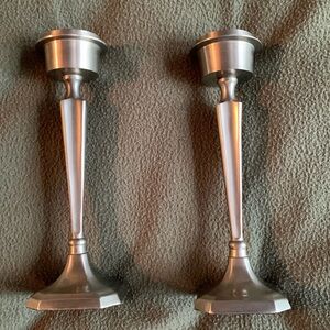 Beautiful silver candlesticks. Approx. 8 1/2 inches tall. Hold 1 3/4 “ candle